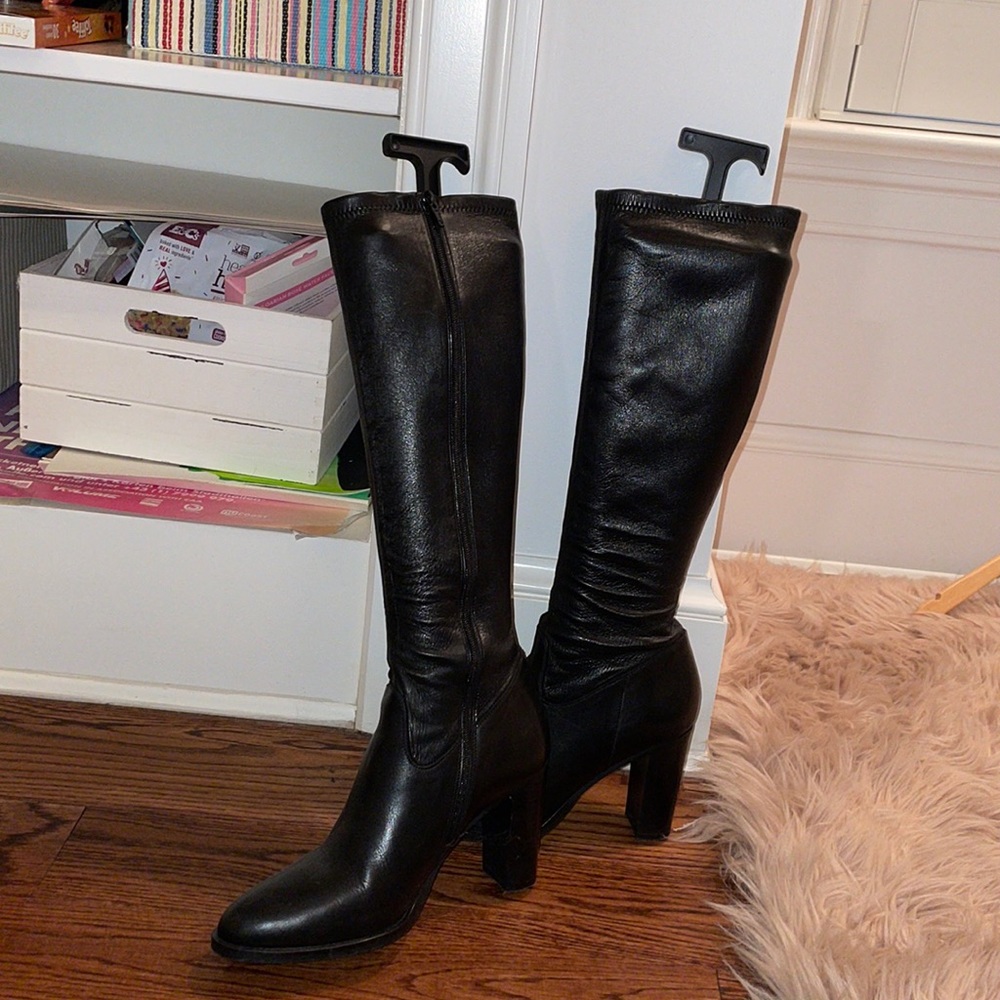 Under the knee heeled boots